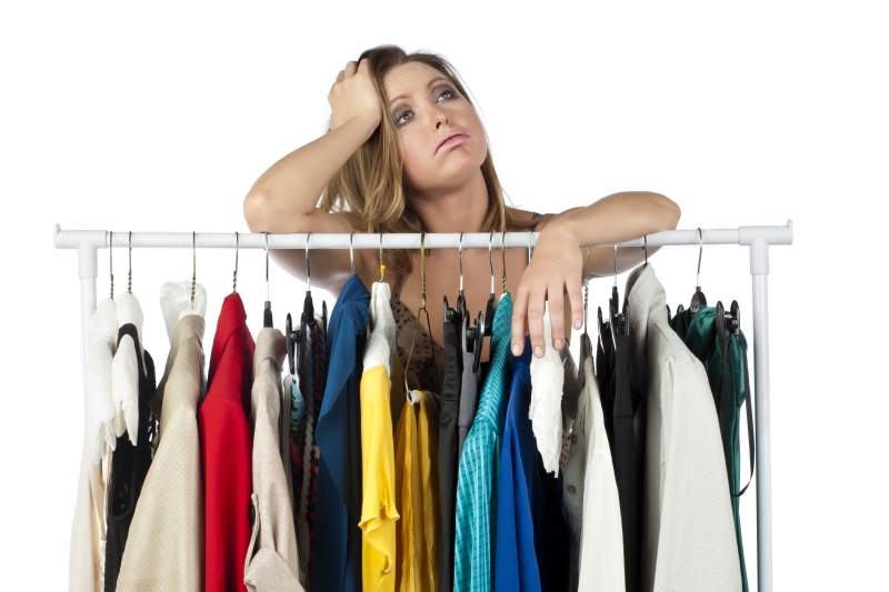 stressed-female-with-clothes-collection 1
